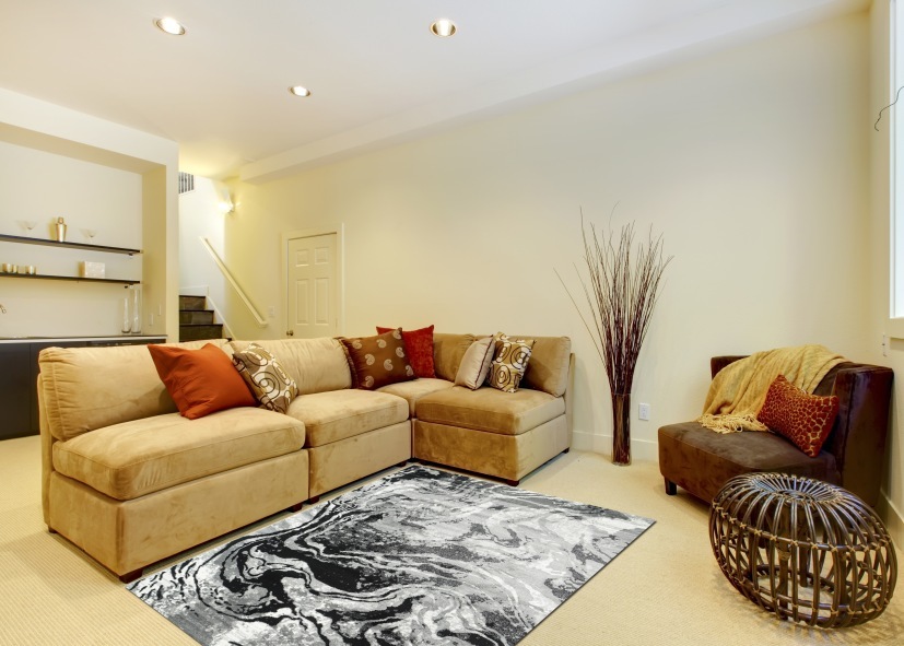 Living room staircase with bathroom and bar.